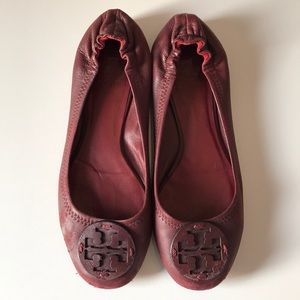 Tory Burch flats in dark burgundy.